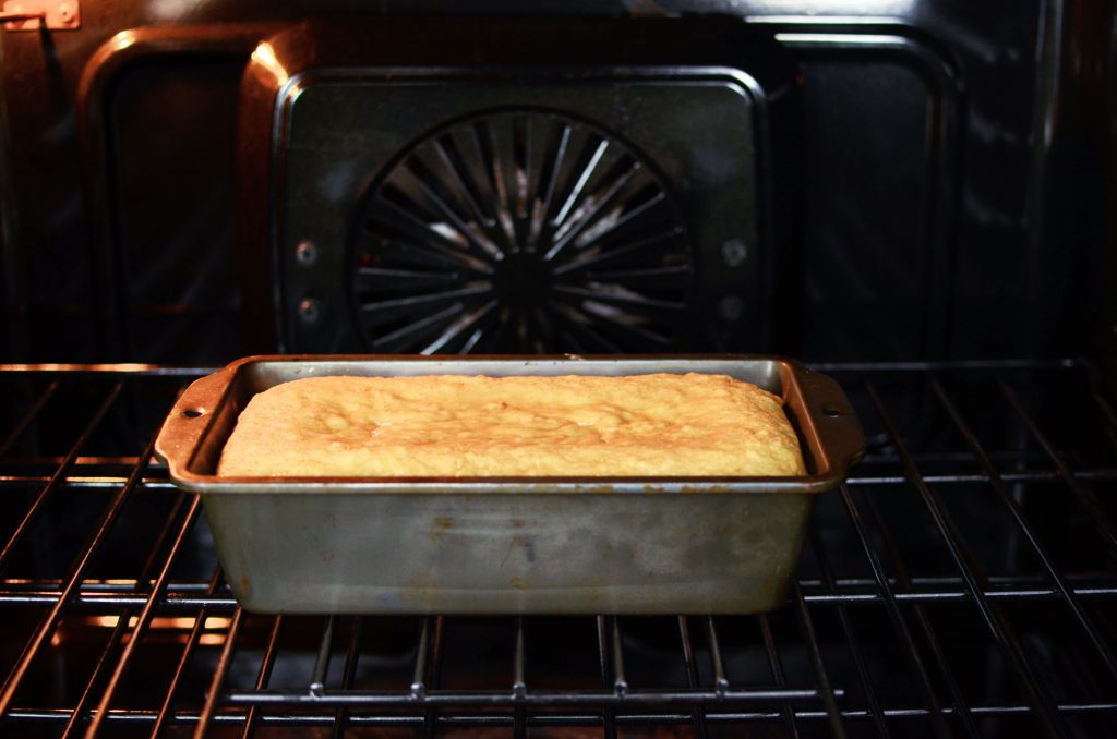 partially baked banana bread in oven