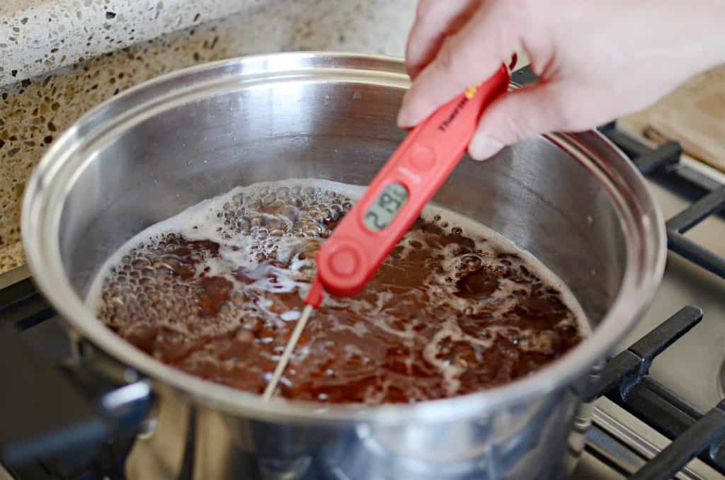 Boiling syrup until 219 degrees inside using digital thermometer