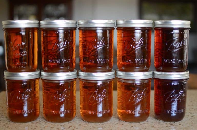 stacked pint jars of maple syrup