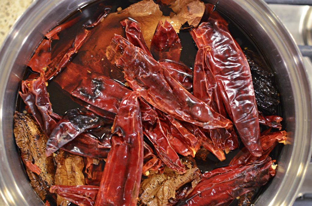 toasted chilies in large pot filled with water