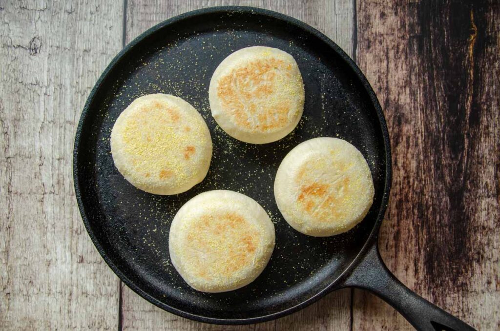 English muffins on a cast iron skillet 