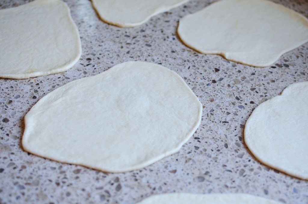 Multiple rolled out flour tortillas