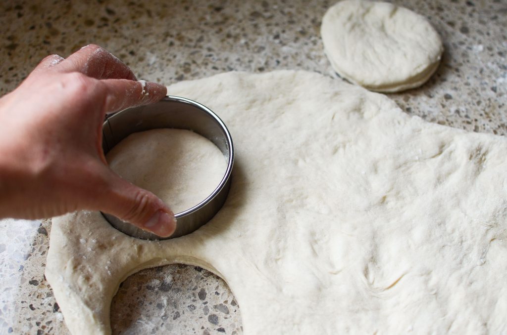 sourdough English muffins cut out with cutter