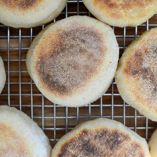 Sourdough English muffins on wire cooling rack