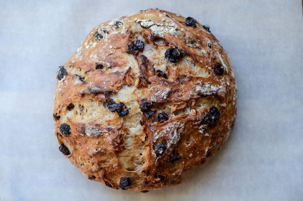 baked round cranberry walnut bread loaf