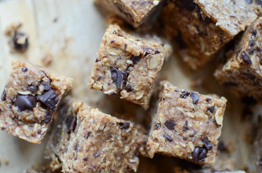 Bite-size heavenly hunk copycat bars on wooden cutting board