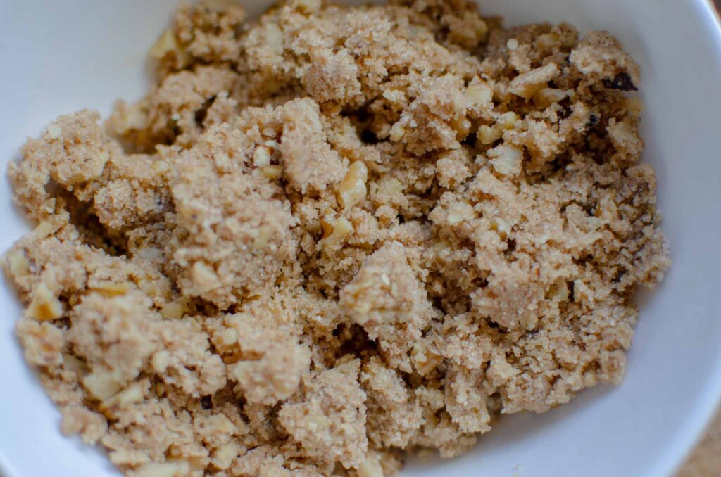 Discard apple walnut bread loaf streusel in bowl