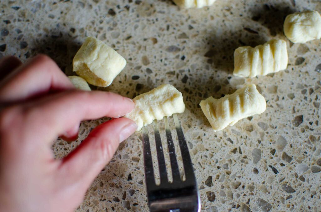 ricotta gnocchi cut pieces rolled against the back of a fork