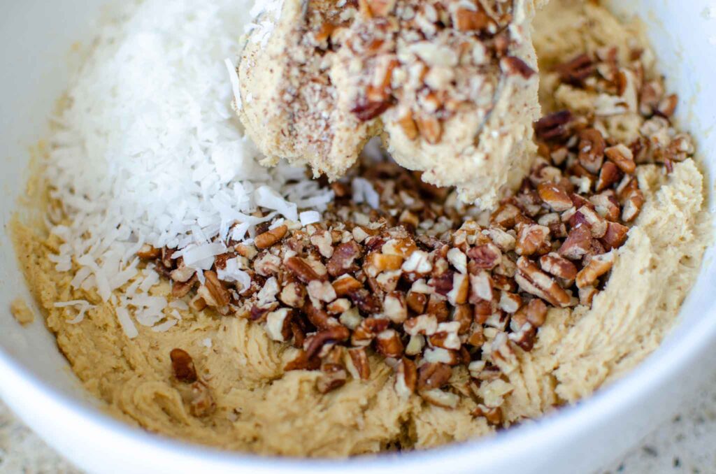 discard coconut pecan cookie dough with pecans and shredded coconut flakes