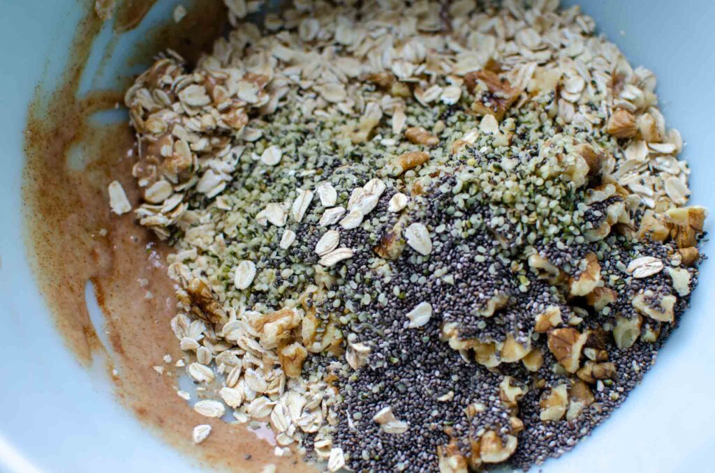 adding the dry ingredients to the wet ingredients to make sourdough granola