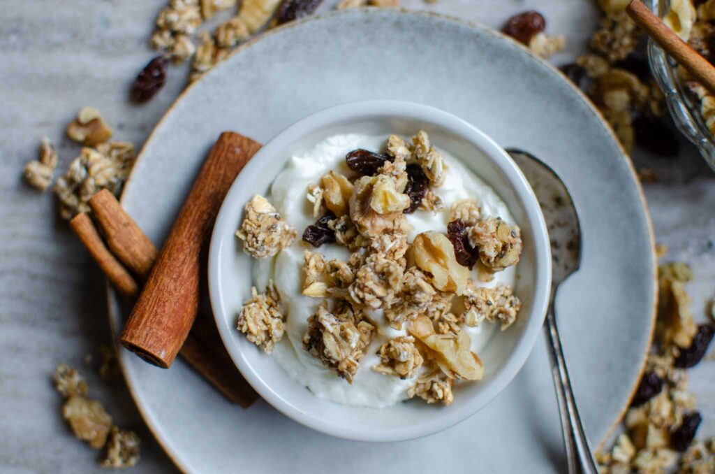 a bowl of sourdough granola and yogurt 