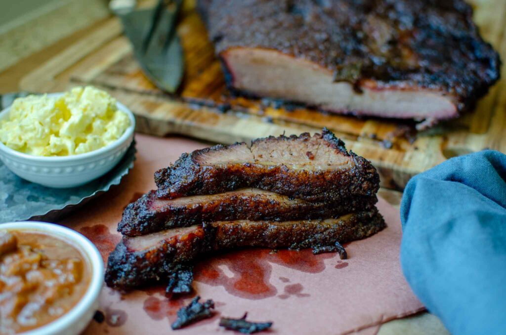 Sliced smoke brisket on butcher paper