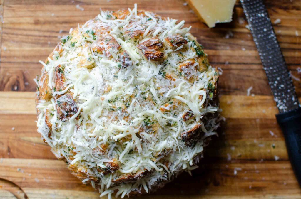 shredded cheese stuffed into cut sourdough loaf