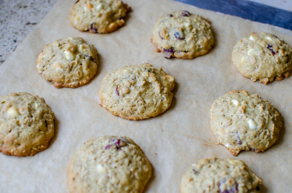 sourdough white chocolate cranberry oatmeal cookies on baking sheet