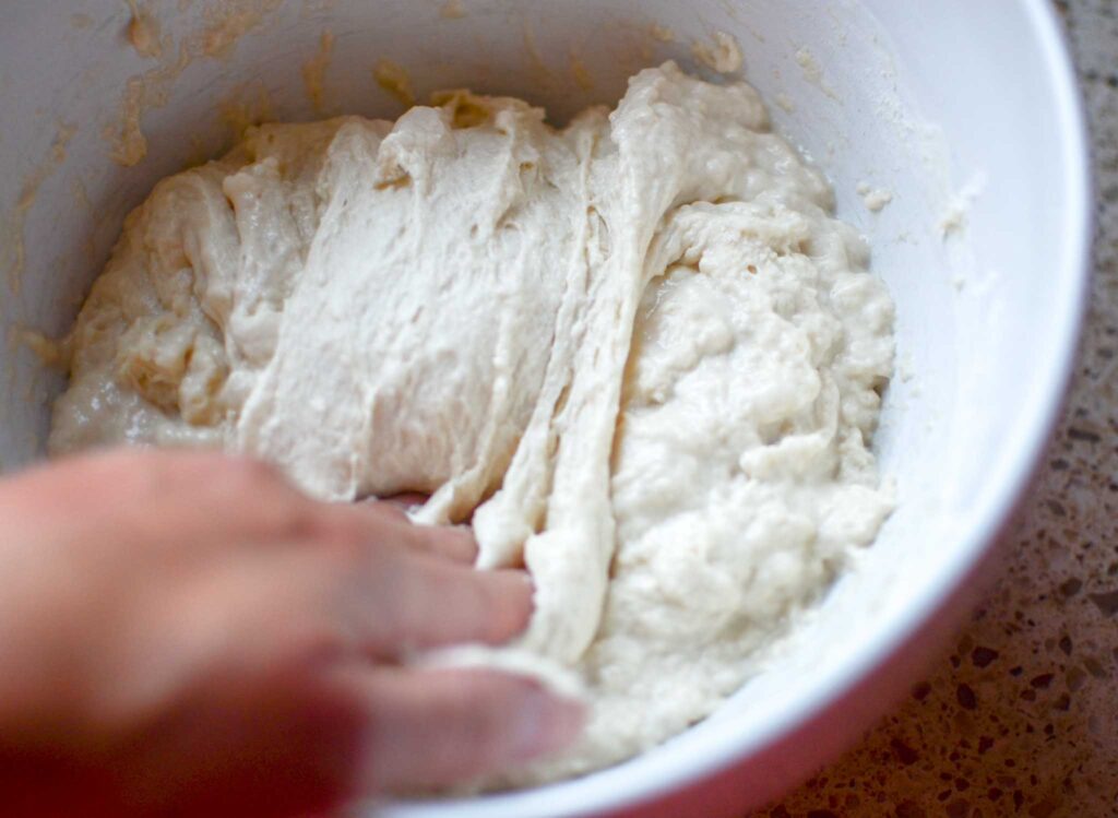 sourdough cinnamon roll focaccia dough folded over