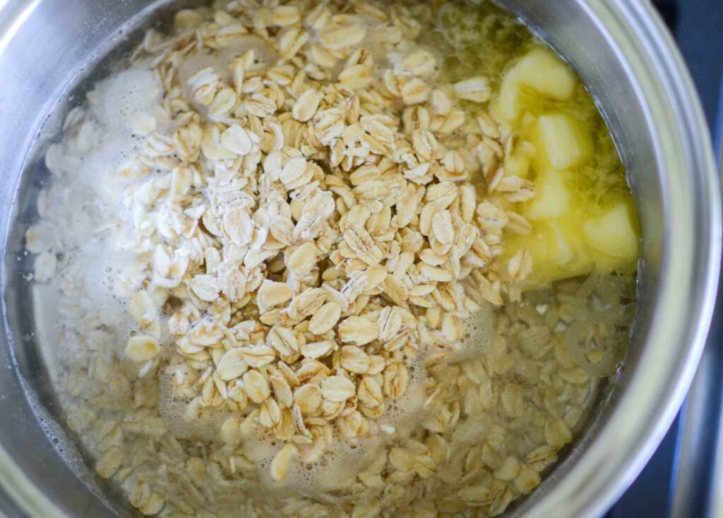 oats, water and butter in a pan