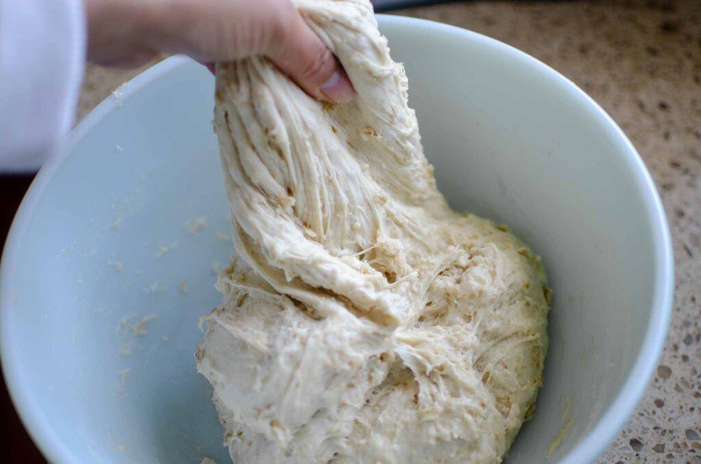 Stretching the dough that smooth and elastic