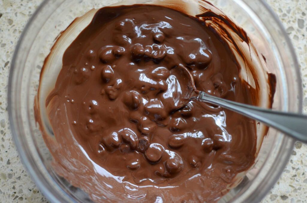 melting chocolate chips in glass bowl