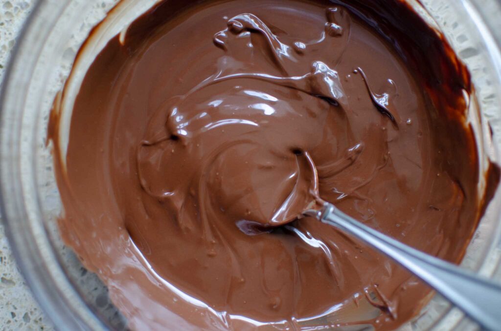 all of the chocolate melted in glass bowl