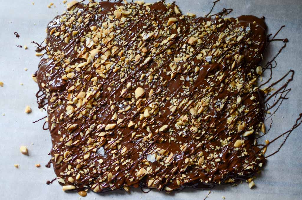 date snickers bars with chopped peanuts and flaky salt