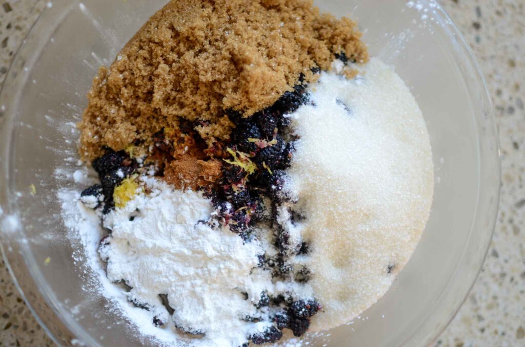 mulberry pie filling ingredients in a glass bowl