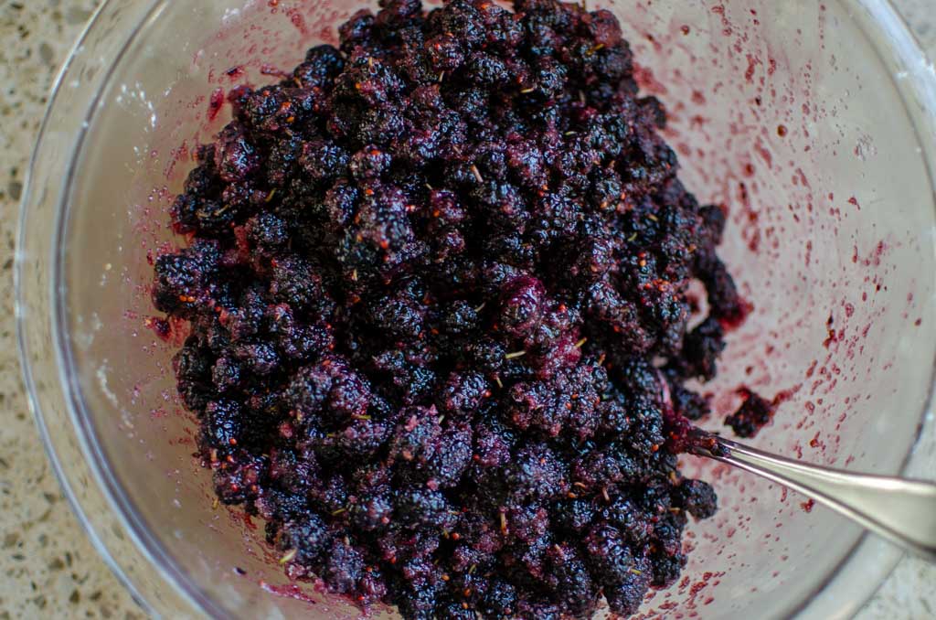 mixed mulberry pie filling in glass bowl