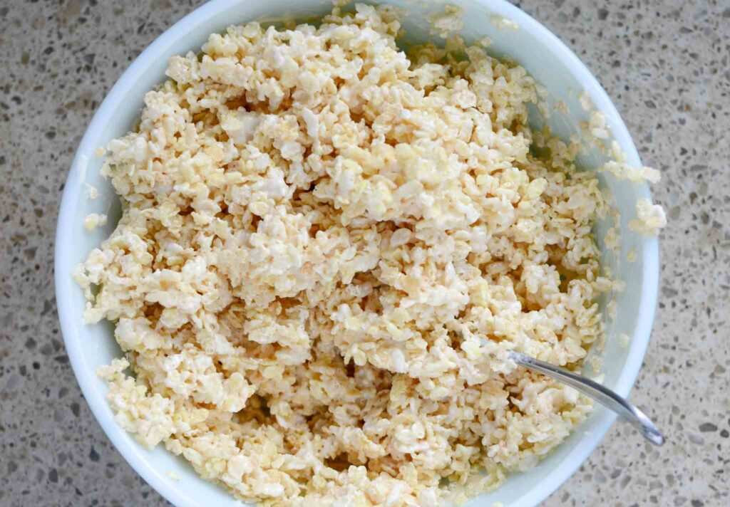 melted marshmallows and rice cereal mixture in bowl