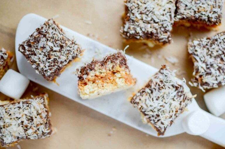 Coconut Caramel Rice Crispy Treat - Samoa Treats on a marble tray