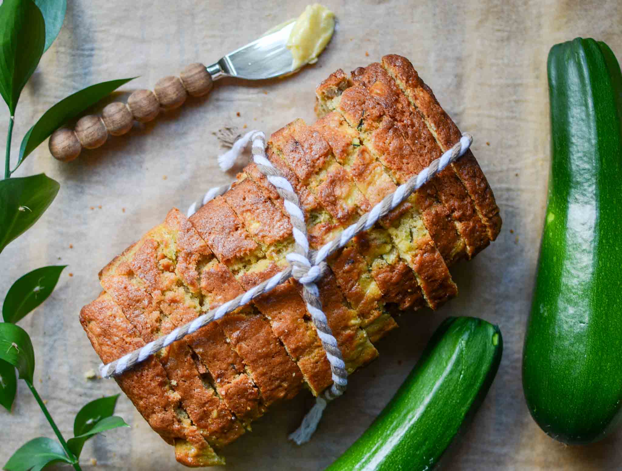 sourdough zucchini bread loaf sliced and tied with string