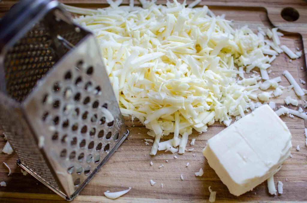 shredded mozzarella cheese with a box grater