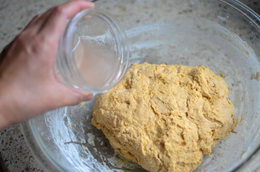 Adding salt water to sourdough pumpkin dough