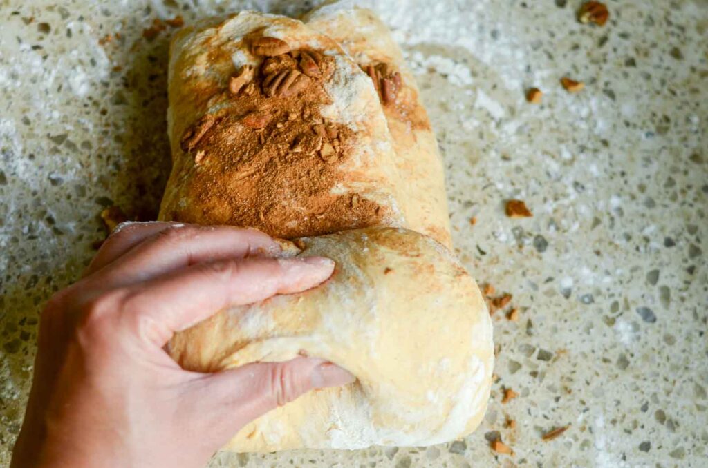 rolling the sourdough pumpkin dough