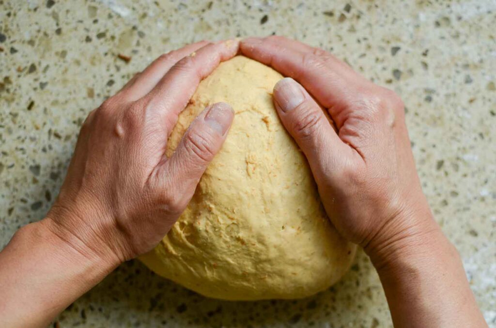 shaping the sourdough pumpkin dough