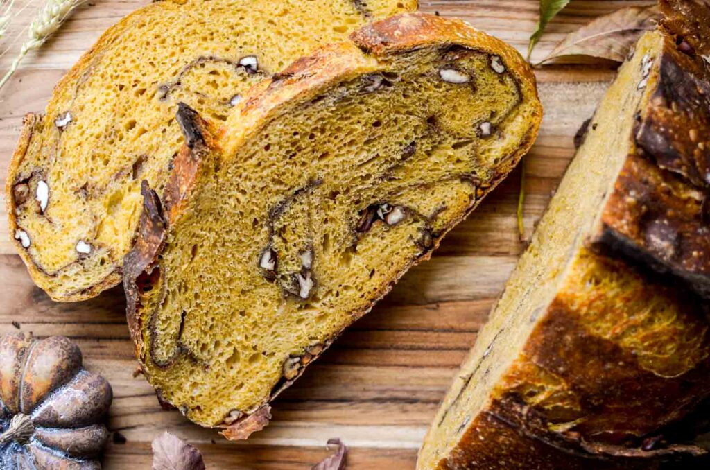 artisan pumpkin and pecan sourdough bread cut into slices