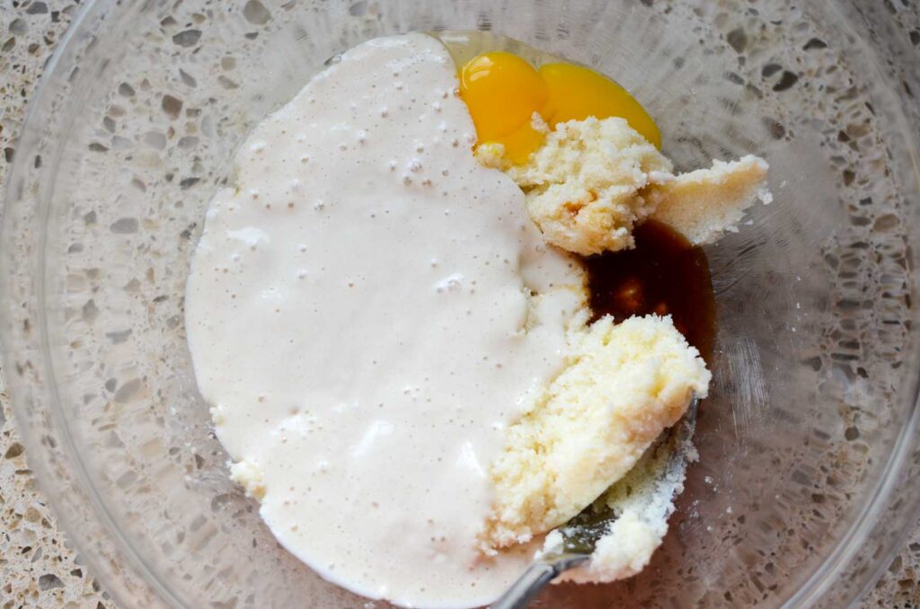 sourdough discard, egg, vanilla extract, butter and sugar in glass bowl