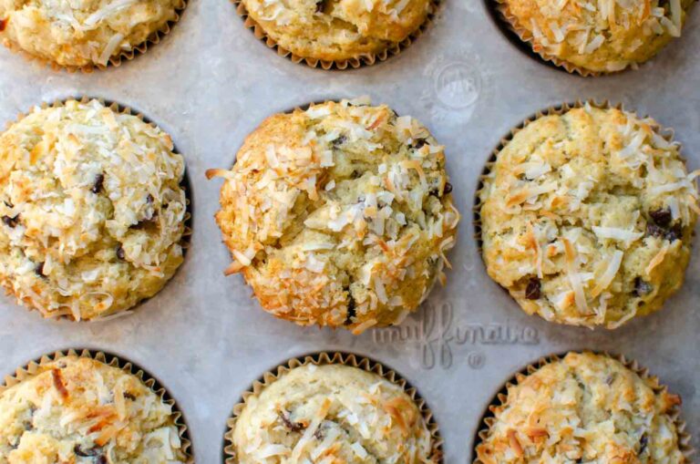 sourdough banana coconut chocolate chip muffins in a muffin pan