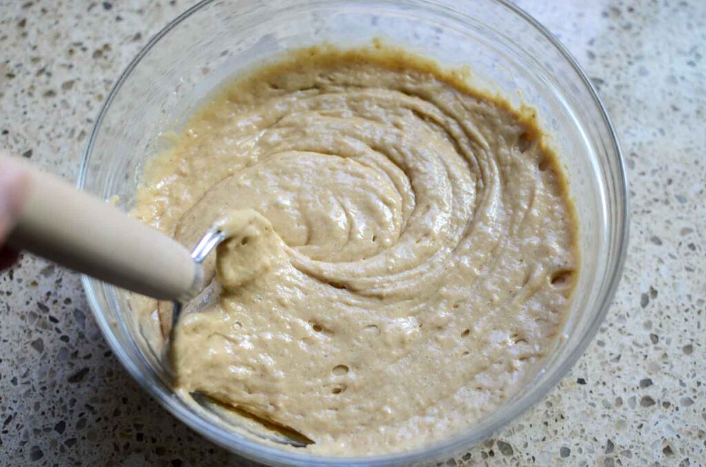 sourdough apple cider doughnut batter in a bowl