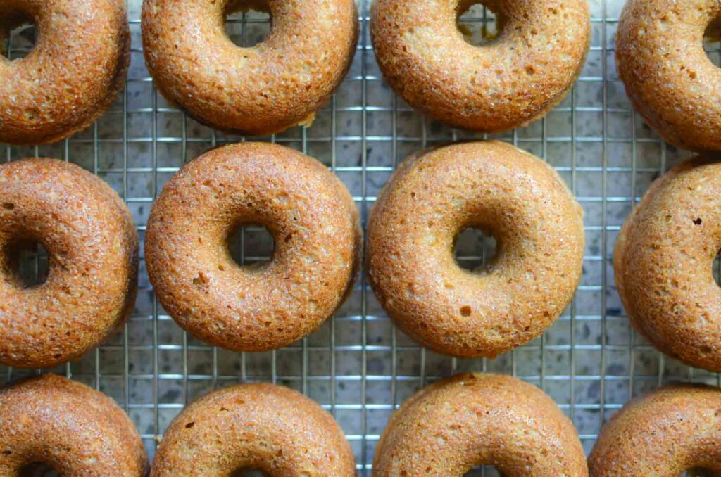 sourdough apple cider donuts on wire rack