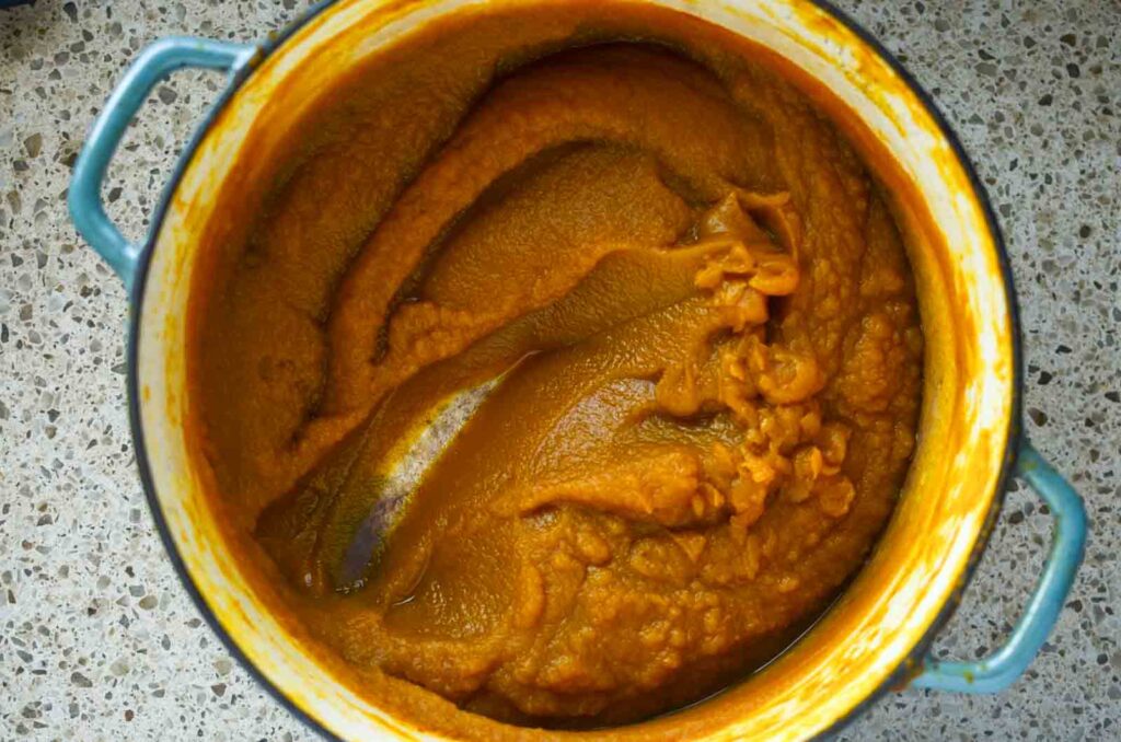 Cooked down pumpkin butter in dutch oven