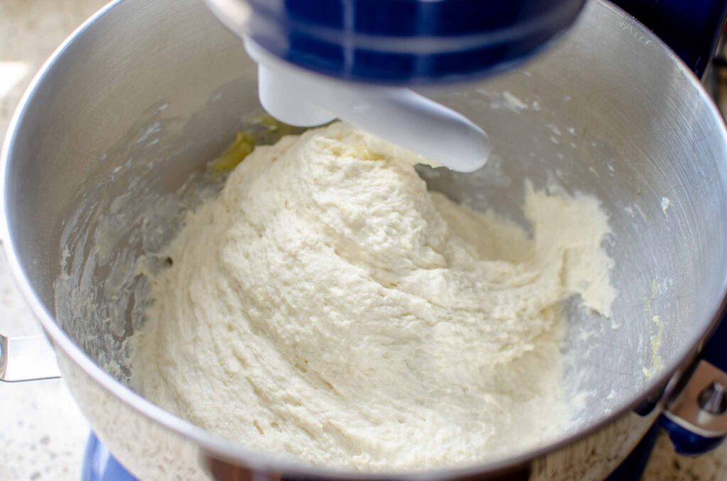 mixing the sourdough discard focaccia dough in a stand mixer