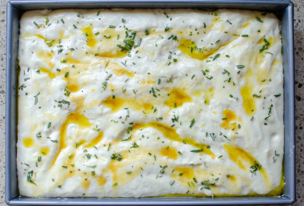 sourdough discard focaccia dough in pan