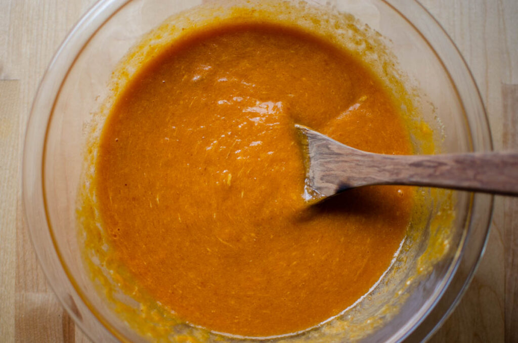 mixed wet ingredients in a glass bowl