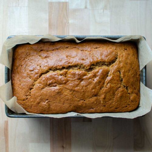 a loaf of sourdough discard pumpkin quick bread