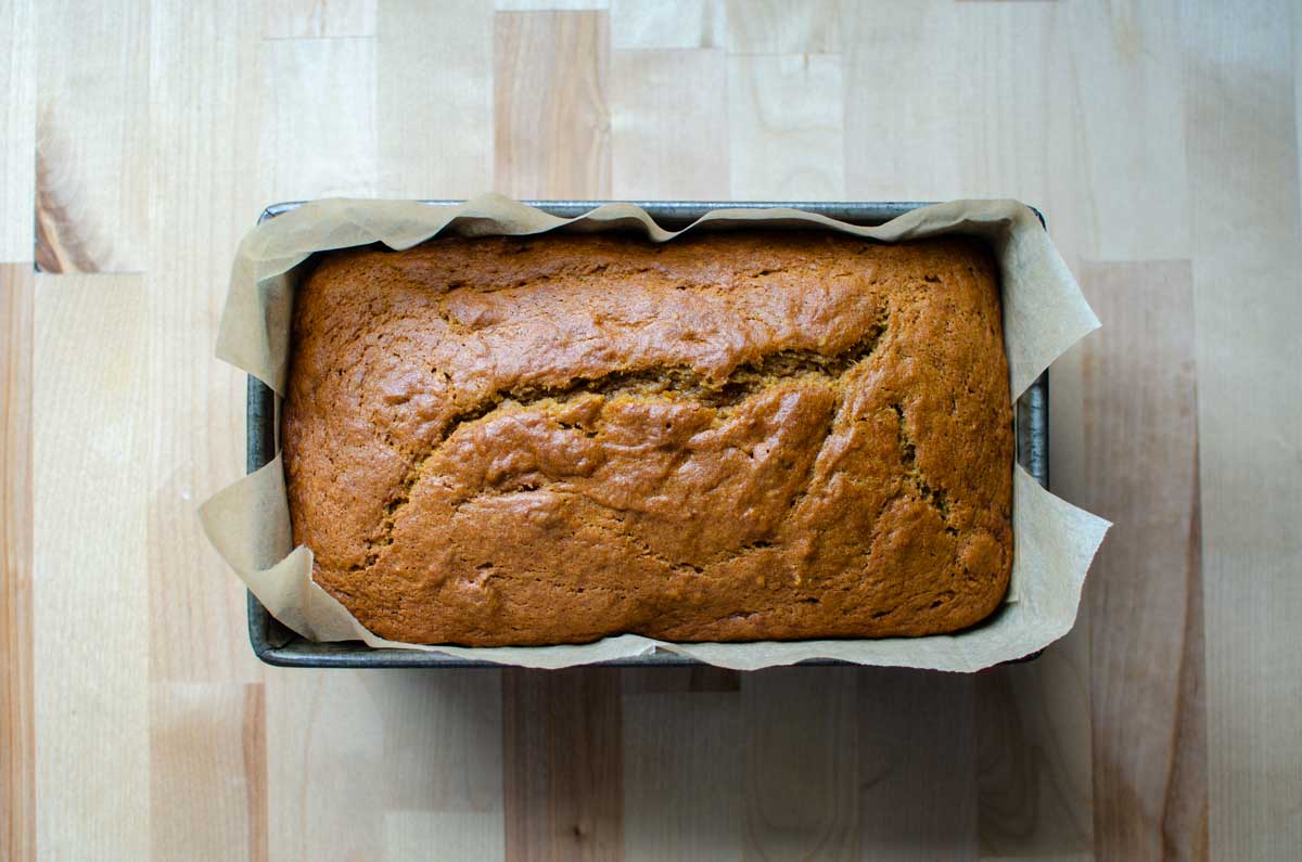 a loaf of sourdough discard pumpkin quick bread