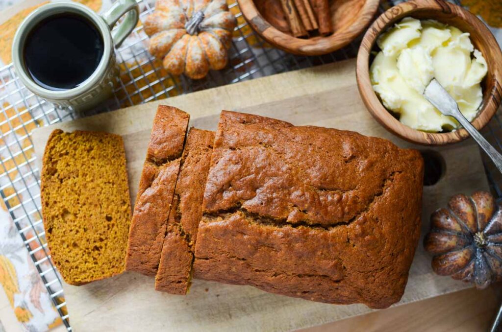 sourdough discard pumpkin quick bread loaf cut into slices