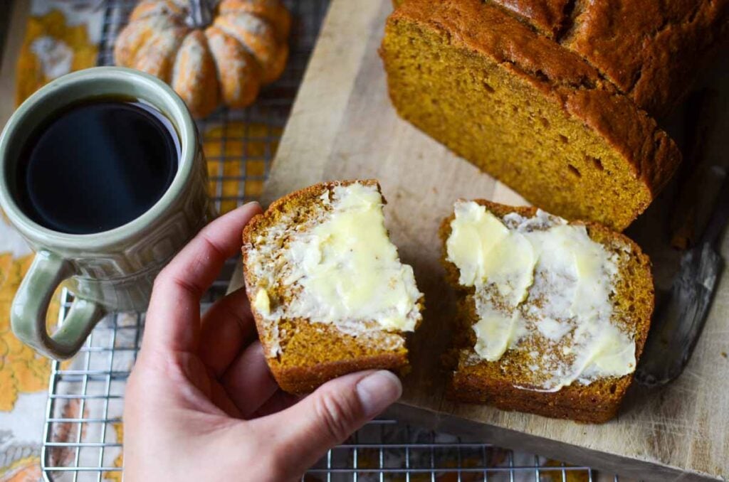 Same Day Sourdough Discard Pumpkin Quick Bread slices with butter