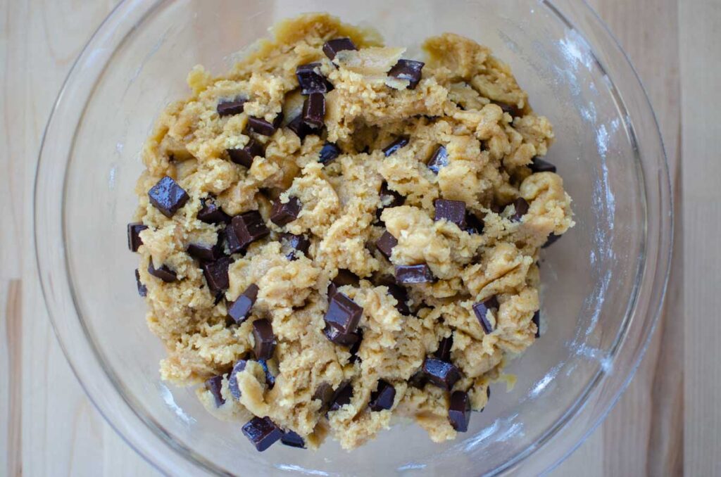 browned butter sourdough chocolate chip cookie dough in glass bowl