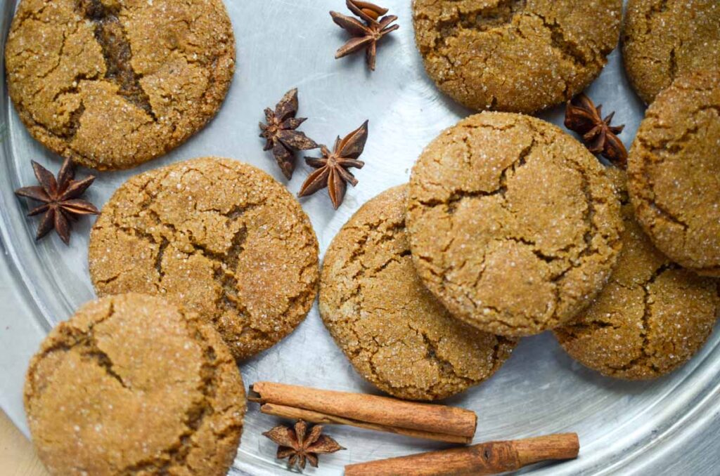 soft and chewy sourdough molasses cookies on metal tray