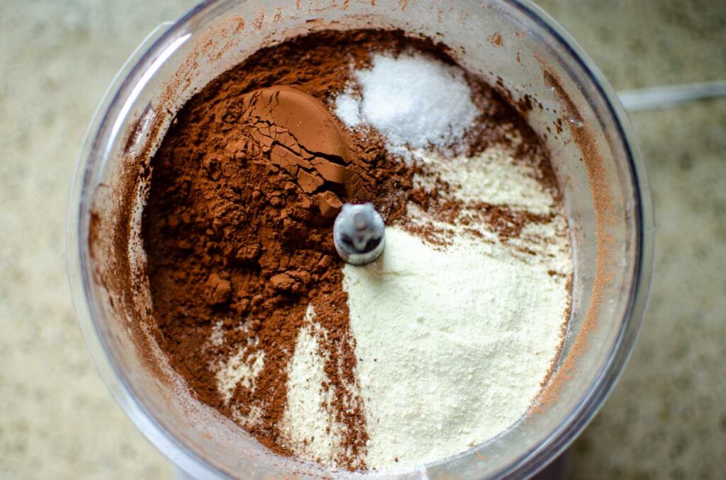 adding the remaining ingredients for hot cocoa mix