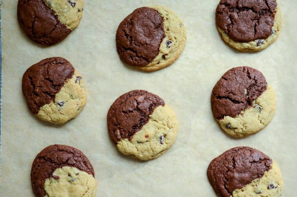 brookie cookies on a parchment lined baking sheet